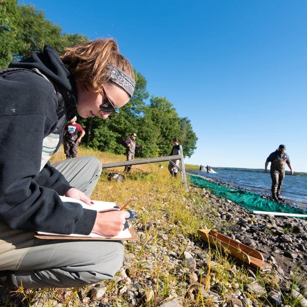 Woman taking notes