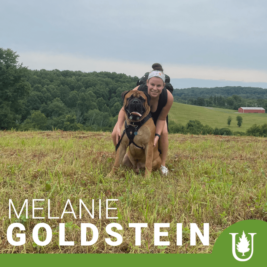 Melanie, an Unity grad, smiles at the camera with her dog and the text Where Will Unity Take You in front of them.