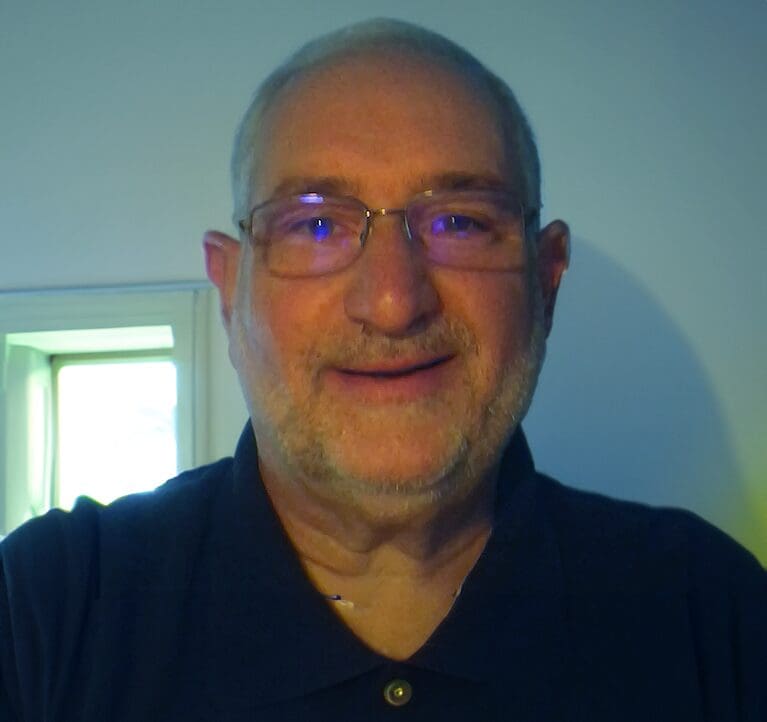 Dr. Paulone smiles at the camera.