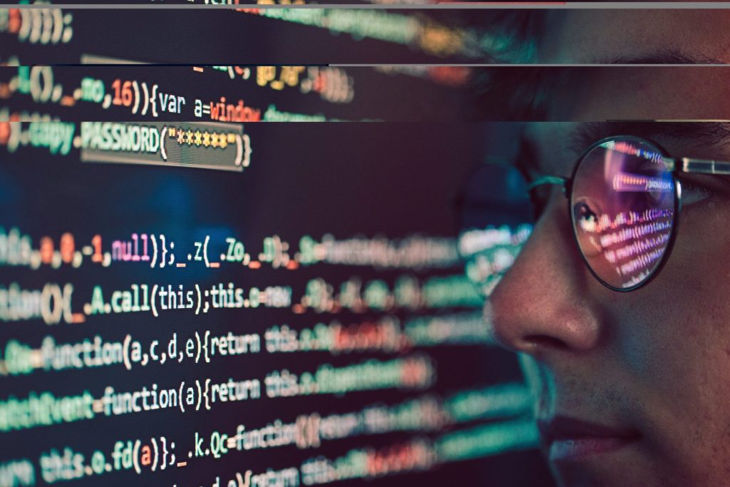 hacker-using-computer-smartphone-and-coding-to-st-2025-03-09-13-09-24-utc
