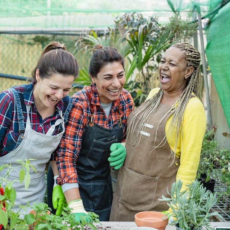 happy-gardeners-having-fun-working-in-garden