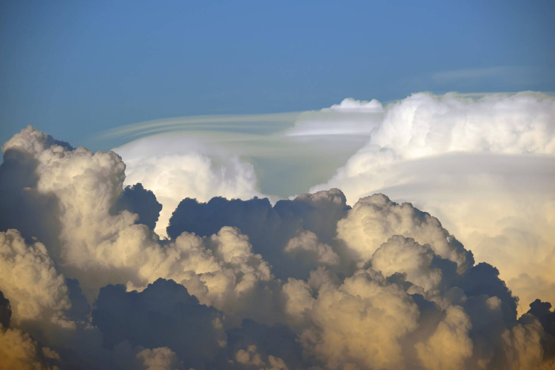 white-fluffy-cumulonimbus-clouds-forming-before-th-2024-12-06-10-54-52-utc