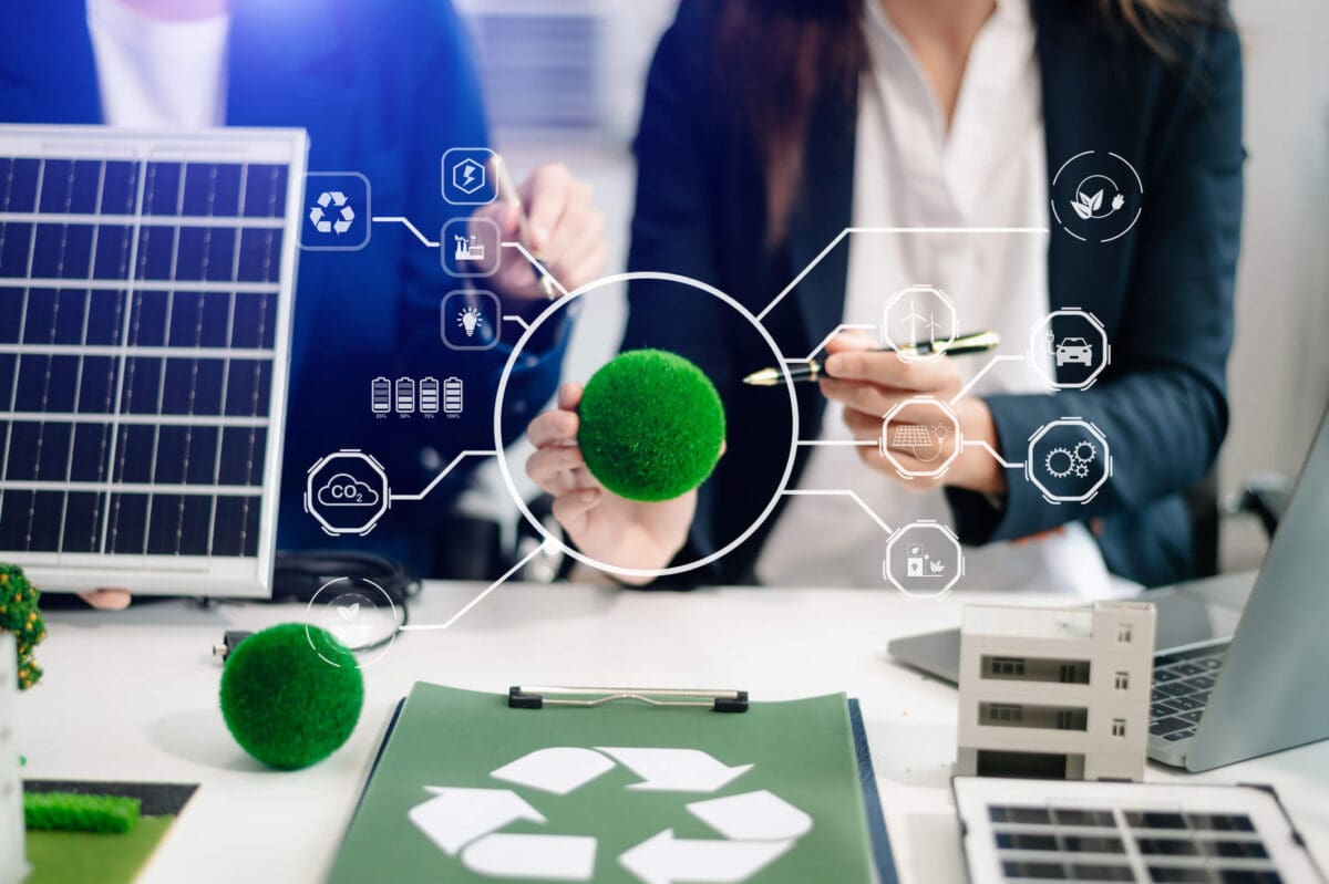 two analysts discussing climate policy with recycling and green environmental imagery