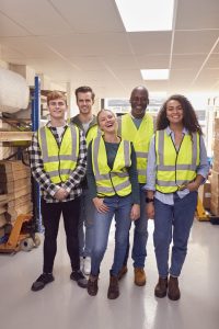 portrait-of-multi-cultural-team-wearing-hi-vis-saf-2024-10-20-18-02-35-utc