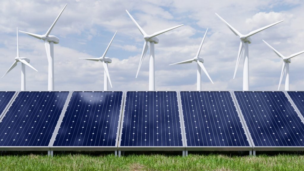 solar-panels-and-wind-turbine-on-the-blue-sky-back-2025-03-12-01-33-39-utc-scaled