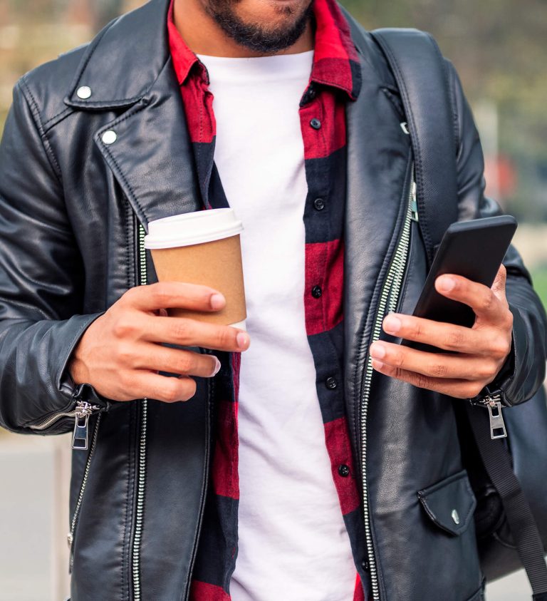 unrecognizable latin student consulting the phone