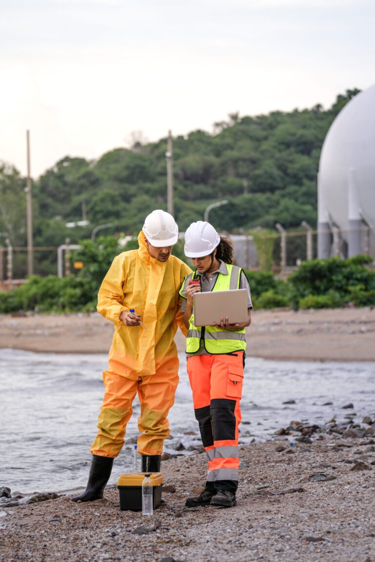 two-environmental-researchers-walk-back-from-shore-2025-07-07-01-41-30-utc