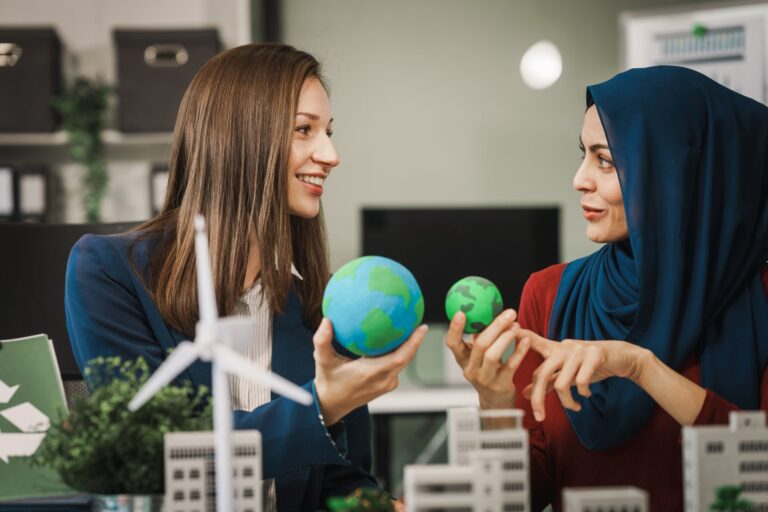 Women-entrepreneurs-holding-globes