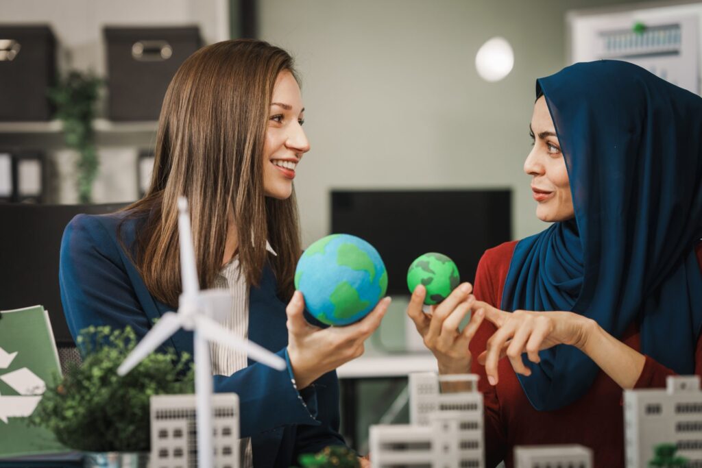Women-entrepreneurs-holding-globes