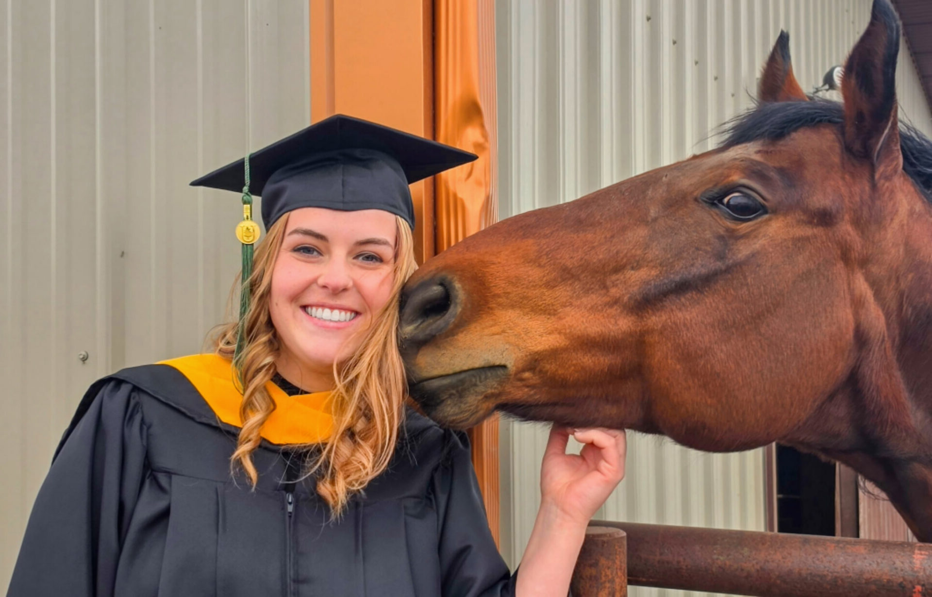 grad-with-horse-masters-e1778533713613