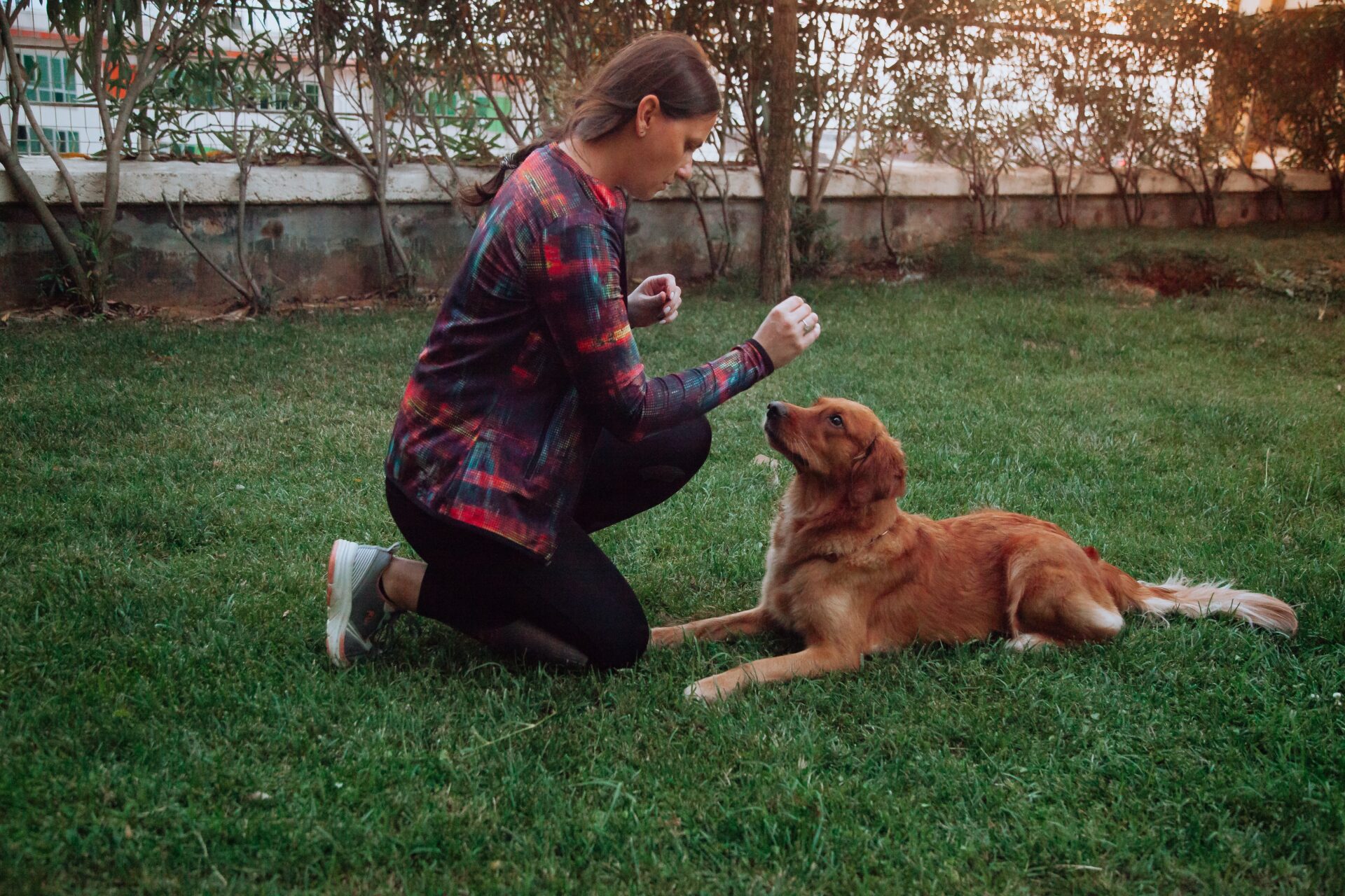 woman-plays-with-dog
